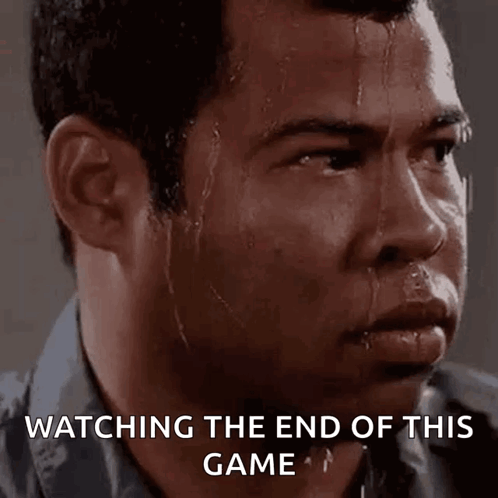 A Man With Sweat Coming Out Of His Face Is Watching The End Of A Game . GIF