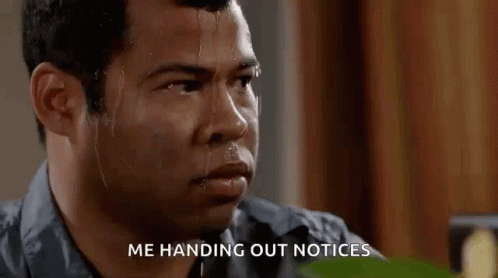 A Man With Sweat Running Down His Face Is Holding Out A Notice . GIF