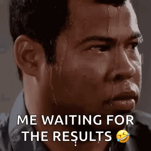 A Man With Sweat Running Down His Face Is Waiting For The Results GIF