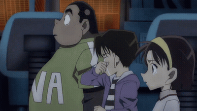 A Man With The Letter Va On His Back Stands Next To Two Girls GIF