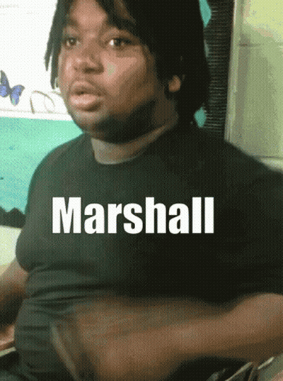 A Man With The Name Marshall On His Shirt GIF