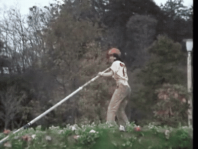 A Man With The Number 1 On His Back GIF