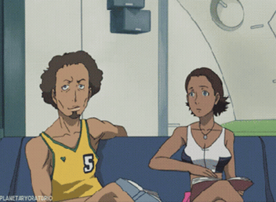 A Man With The Number 5 On His Jersey Sits Next To A Woman On A Couch GIF