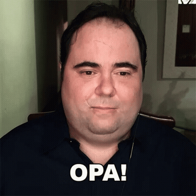 A Man With The Word Opa Written In White GIF