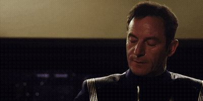 A Man With The Word You 'Re On The Top Of His Head GIF