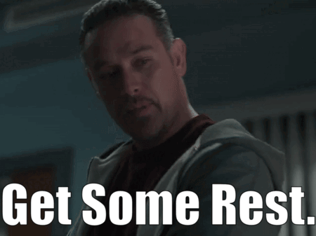 A Man With The Words Get Some Rest Written On His Face GIF