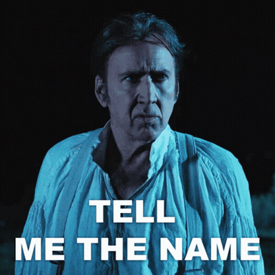 A Man With The Words Tell Me The Name On The Bottom GIF