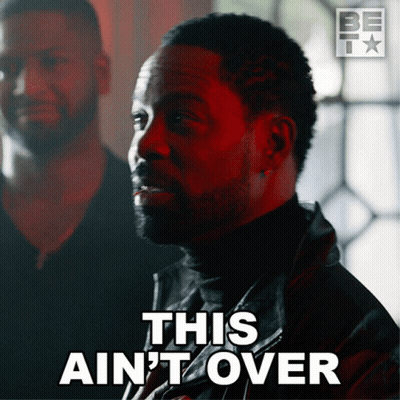 A Man With The Words This Ain 'T Over Written On His Face GIF