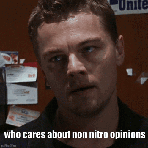 A Man With The Words Who Cares About Non Nitro Opinions Written Below Him GIF
