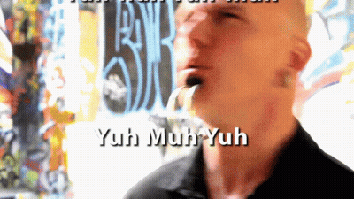 A Man With The Words Yuh Muh Yuh Written On His Face GIF