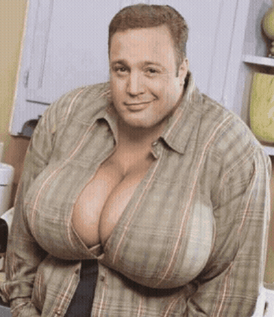 A Man With Very Large Breasts Is Wearing A Plaid Shirt And Smiling GIF