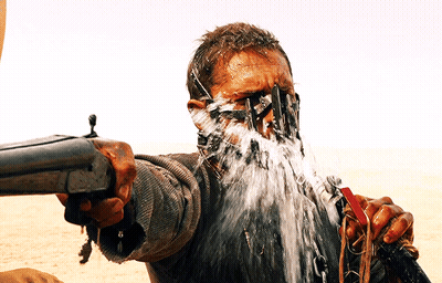 A Man With Water Coming Out Of His Mouth And A Gun GIF