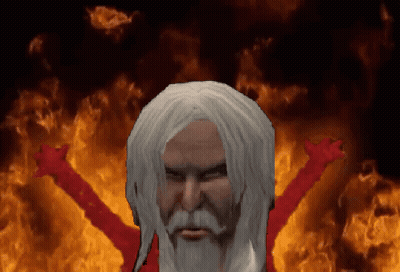 A Man With White Hair And A Beard Is In Front Of A Fire Background GIF
