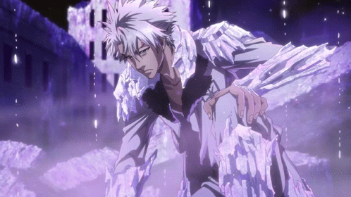 A Man With White Hair And A Purple Background Is Holding A Piece Of Ice GIF