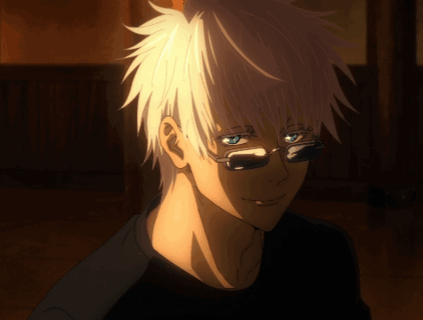 A Man With White Hair And Glasses Is Smiling GIF