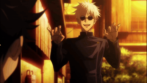 A Man With White Hair And Sunglasses Is Smiling And Making A Funny Face GIF