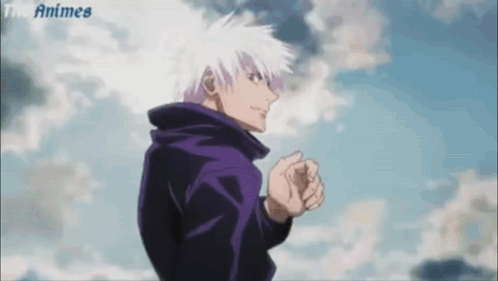 A Man With White Hair Is Standing In Front Of A Blue Sky . GIF