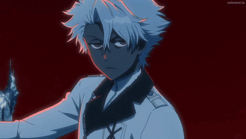 A Man With White Hair Is Standing In Front Of A Red Background With Animelist.tv Written On The Bottom GIF