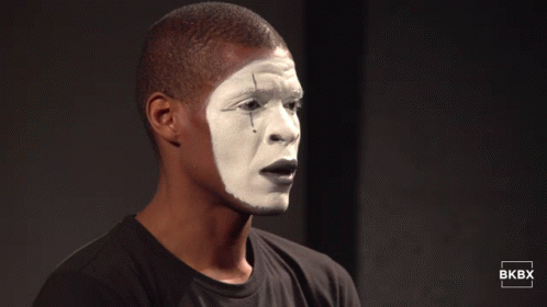 A Man With White Paint On His Face And The Bkbx Logo In The Corner GIF