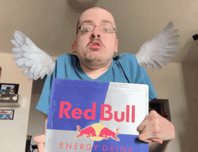 A Man With Wings Holds A Can Of Red Bull Energy Drink GIF