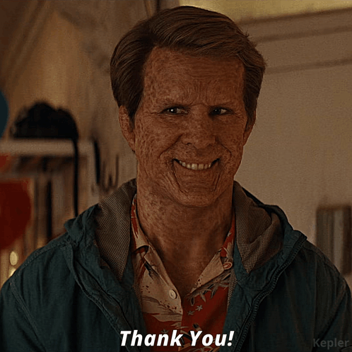 A Man With Wrinkles On His Face Is Smiling And Says Thank You GIF