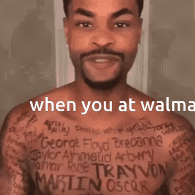 A Man Without A Shirt Has A Lot Of Tattoos On His Chest Including The Name Martin Oscar GIF