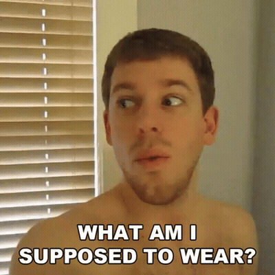 A Man Without A Shirt Is Asking What Am I Supposed To Wear GIF