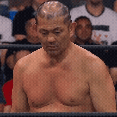 A Man Without A Shirt Is In A Boxing Ring GIF