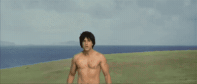 A Man Without A Shirt Is Looking At The Camera GIF