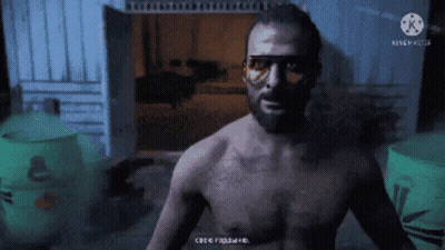A Man Without A Shirt Is Standing In A Dark Room With A Green Barrel In The Background And A Watermark For Kinemaster GIF