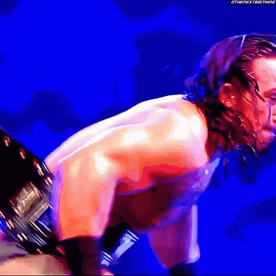 A Man Without A Shirt Is Standing In Front Of A Blue Background With The Hashtag #Thenextbigthing GIF