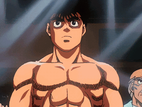 A Man Without A Shirt Is Standing In Front Of A Crowd GIF