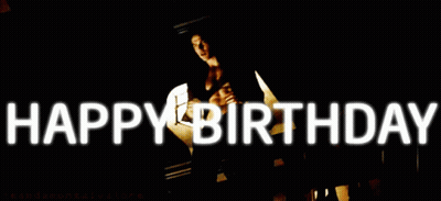 A Man Without A Shirt Is Standing In Front Of A Sign That Says " Happy Birthday " GIF