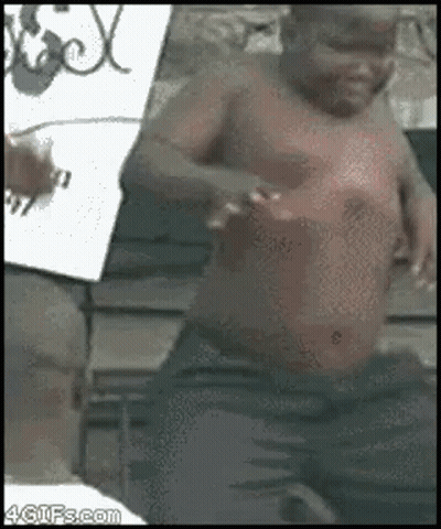 A Man Without A Shirt Is Standing In Front Of A Sign That Says ' X ' GIF