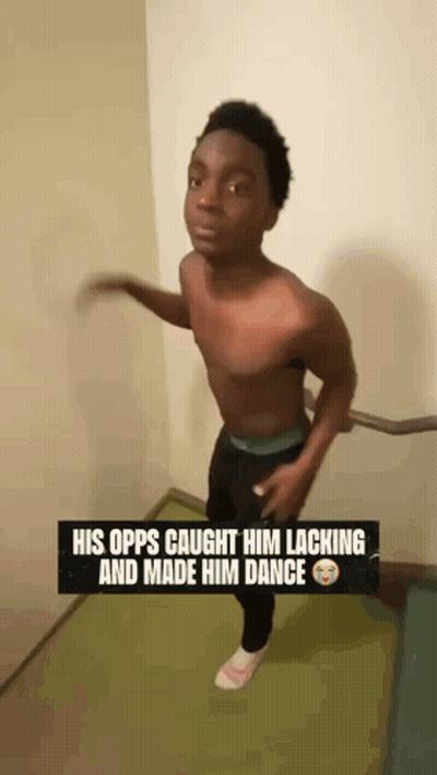 A Man Without A Shirt Is Standing On A Staircase With The Caption His Opps Caught Him Lacking And Made Him Dance . GIF
