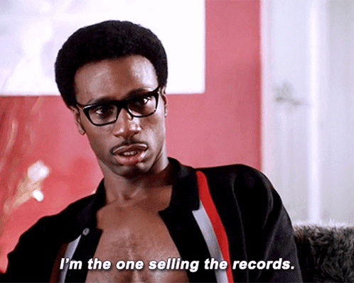A Man Without A Shirt Is Talking About Selling The Records GIF