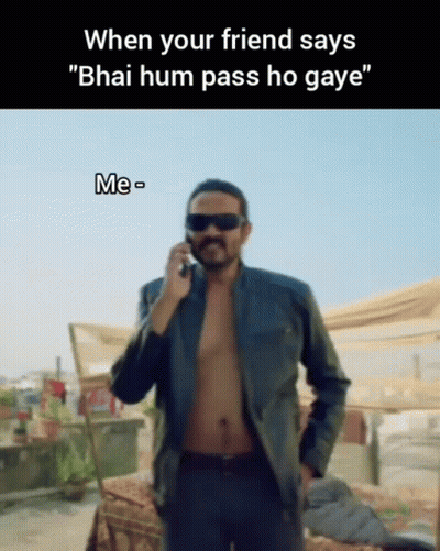 A Man Without A Shirt Is Talking On A Cell Phone While Wearing Sunglasses . GIF