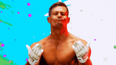 A Man Without A Shirt Is Wearing Gloves And Making A Face . GIF