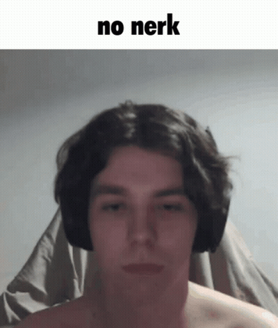 A Man Without A Shirt Is Wearing Headphones And Making A Face . GIF