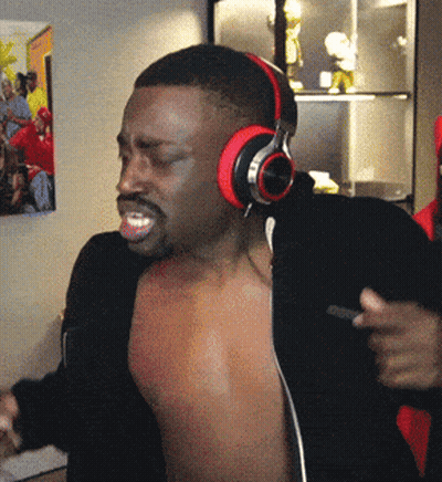 A Man Without A Shirt Is Wearing Headphones GIF