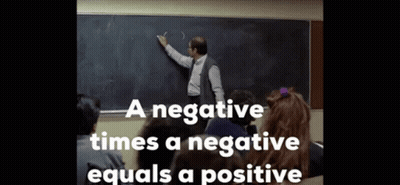 A Man Writing On A Blackboard With The Words " A Negative Times A Negative Equals A Positive " Below Him GIF
