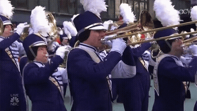 A Marching Band Is Performing On A Live Nbc Channel GIF