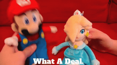A Mario And Rosalina Stuffed Animal Are Being Held By A Person GIF
