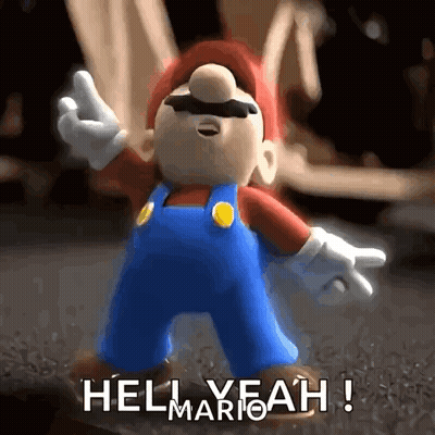 A Mario Figurine Says Hell Yeah In A Gif