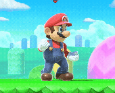 A Mario Video Game Character Is Standing On A Green Hill GIF
