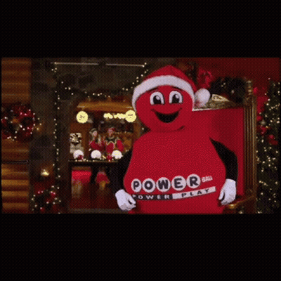 A Mascot For Power Ball Is Wearing A Santa Hat GIF