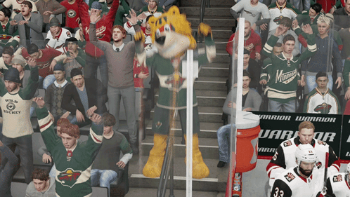 A Mascot For The Minnesota Wild Stands In Front Of A Crowd Of Fans GIF