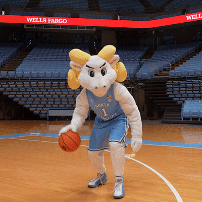 A Mascot For The North Carolina Team Is Holding A Basketball GIF