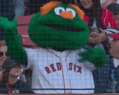 A Mascot For The Red Sox Is Waving His Hands In The Air GIF