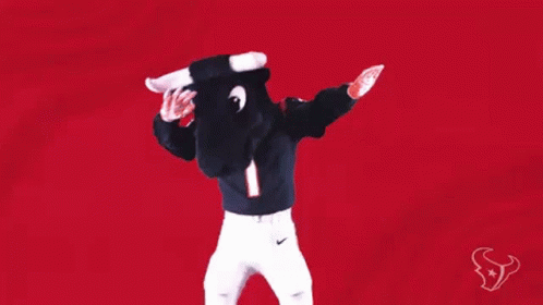 A Mascot For The Texans Is Wearing A Bull Costume And Dancing . GIF
